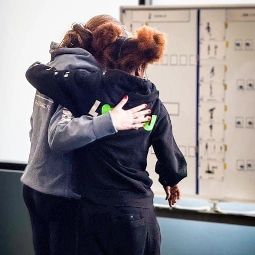 Inclusive Fitness Hug at the Board