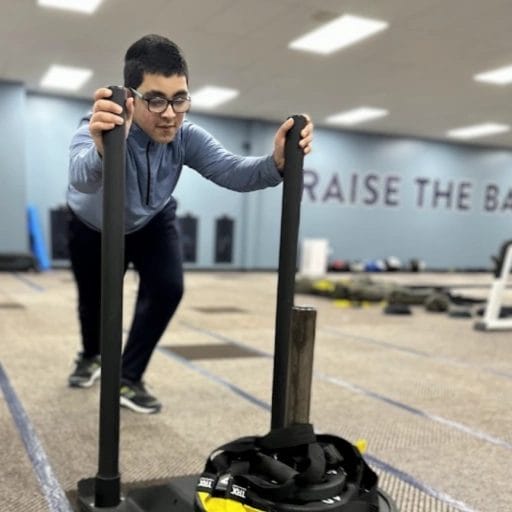News & Media 1 Inclusive Fitness Guy Sled Push